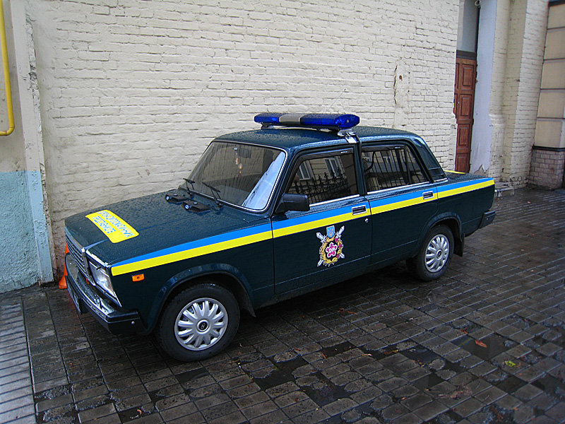 I realized I hadn't taken any photos of police yet in Moscow. Some drive cars like this with a little different color scheme. The car is a Lada, Russian made.