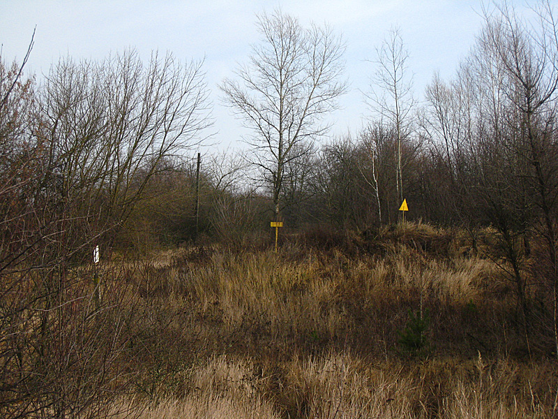 The yellow signs are where buildings have been buried because they were radioactive.