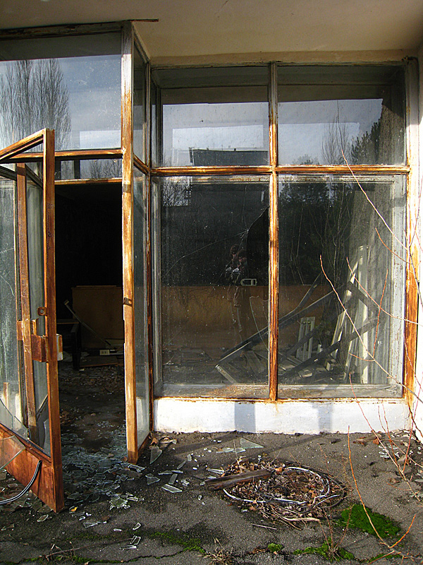 My broken reflection sort of represents how this entire place is: broken and almost incapable of becoming whole again.