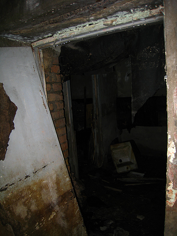The basement. We were curious to enter but scared out of our wits. So we tried using our camera flashes as flashlights.